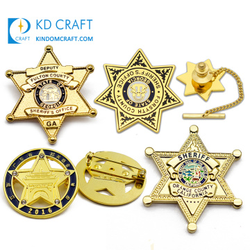 China venta al por mayor de metal en blanco aleación de zinc 3d en forma de estrella esmalte grabado chapado en oro personalizado insignia de sheriff personalizada